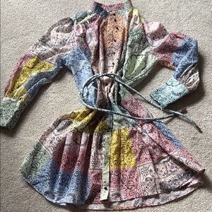 Vibrant pattern swing dress with belt